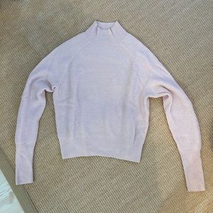 Light pink cashmere waffle turtleneck sweater
